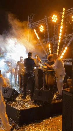 Nighttime outdoor concert in Shekvetili draws white-clad dancing crowd