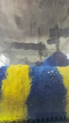 Car wash sequence recorded from inside vehicle in Italy