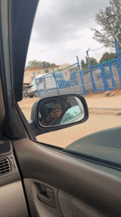 Woman recorded inside vehicle in Abuja, Nigeria