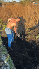 Man digs rectangular hole in residential yard