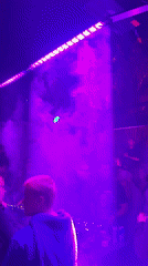 Nightclub scene captured in red lighting in Coachella