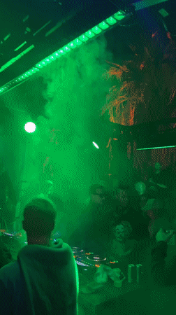 Nightclub scene captured in red lighting in Coachella