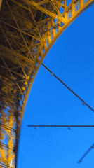 Fireworks illuminate golden Eiffel Tower in Paris evening display