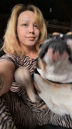 Woman films intimate moments with bulldog at Russian home