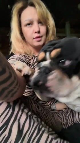 Woman films intimate moments with bulldog at Russian home