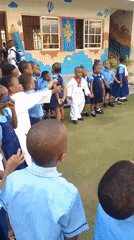 Children arrive at school in Idimu, Nigeria