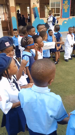 Children arrive at school in Idimu, Nigeria