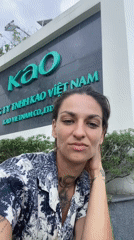 Women pose for photos at Kao Vietnam facility