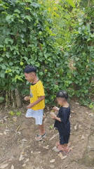 A rural morning in Jambewangi — farm work, free-range kids, local plants