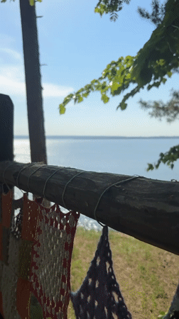 Woman visits scenic lakeside area in Noviy, Russia