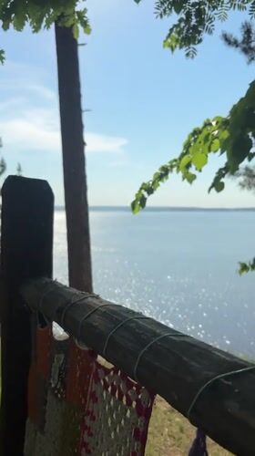 Woman visits scenic lakeside area in Noviy, Russia