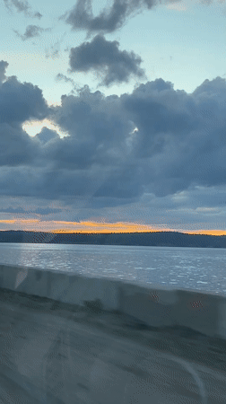 Evening scenes captured across Chaikovsky, Russia infrastructure and waterfront