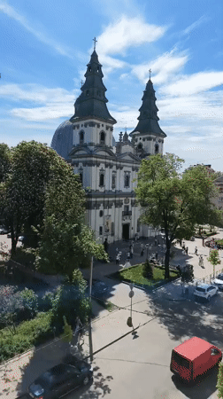 Morning scene captured at twin-tower church in Ternopil square