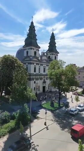 Morning scene captured at twin-tower church in Ternopil square