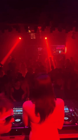 Female DJ performs at Barcelona nightclub in early morning