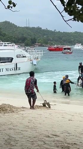 Morning beach activities documented in Ao Nang, Thailand