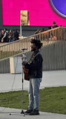 Street musician performs near Victory Monument in Perm, Russia