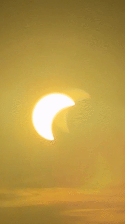 Partial solar eclipse lights up Munich's evening sky