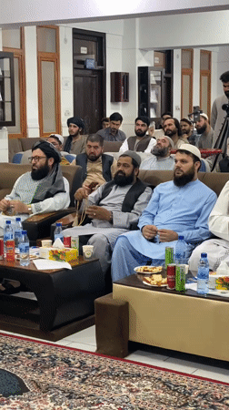 Formal event at Mirwais Neeka University includes woodcarving display
