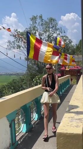 Morning visitors explore Buddhist temple complex in Nha Trang