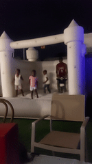 Evening social gathering with drinks and children's bouncy castle in Dar es Salaam