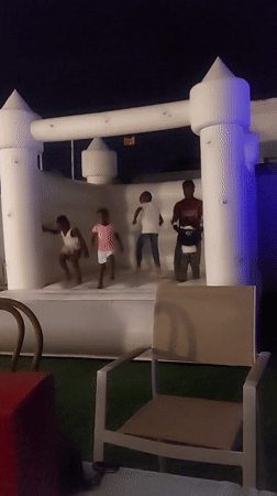 Evening social gathering with drinks and children's bouncy castle in Dar es Salaam