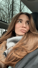 Woman in winter clothing observed in car in Khimki