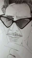 Artist creates detailed pencil portrait using MacBook reference photo