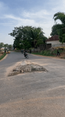 Rollerblader performs street stunts on Akwanga road