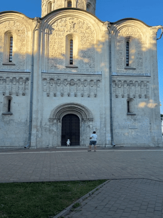 Family visits historic Vladimir cathedrals with toddler