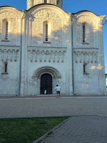 Family visits historic Vladimir cathedrals with toddler