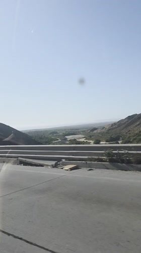 Highway drive captures roadside valley scenery in Tijuana