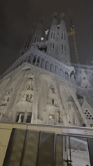 Witness documents illuminated Sagrada Familia during Barcelona evening visit