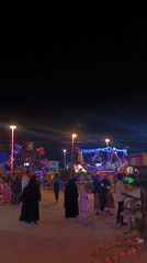 Fairground and street scenes documented across afternoon hours