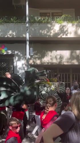 Street festival with dragon parade and music in Terrassa