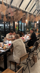 Group lunch at a flower-decorated Ko Samui restaurant