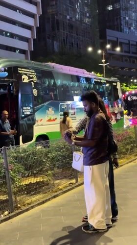 Evening street life documented around Kuala Lumpur's Petronas Towers