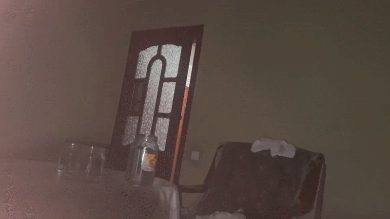 Glass jars and bubbling water in a quiet Fergana room