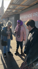 Tourist captures Saint Petersburg landmarks and street life during afternoon walk