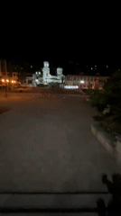 Evening stroll documented through illuminated Nedelino town center