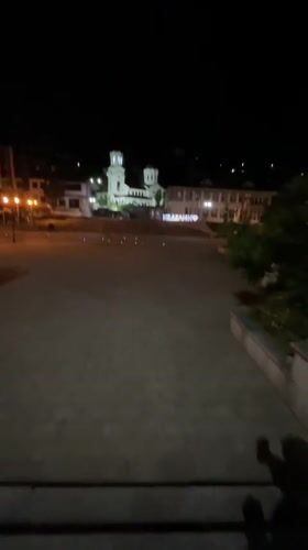 Evening stroll documented through illuminated Nedelino town center