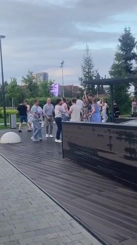Outdoor dancing in a Perm plaza on a July afternoon