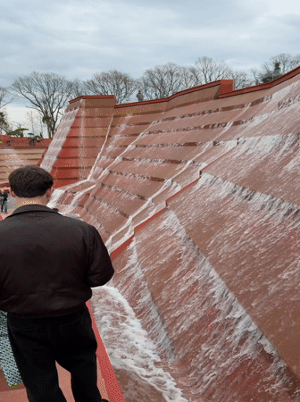Tourists visit and photograph Cascade Fountain in Krasnodar, Russia