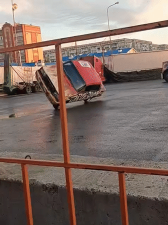 Graffiti-covered cars perform stunts at a Yoshkar-Ola drive show