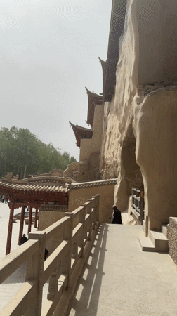 Tourist activity documented at Dunhuang's Mogao Caves and parks