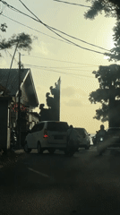 Brief car journey documented through Kuta beach area, Bali