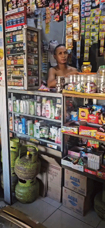 Morning commerce captured across Denpasar shops and food vendors