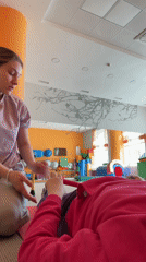 Physical therapy session documented in Izhevsk children's exercise facility
