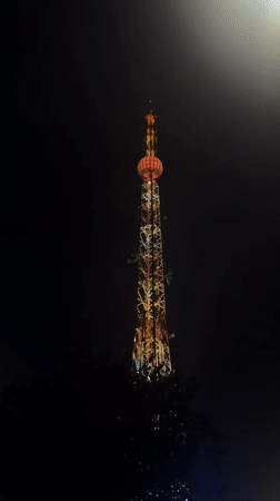 Da Lat at night: towers, cathedral, and rainy streets