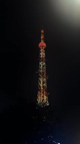 Da Lat at night: towers, cathedral, and rainy streets